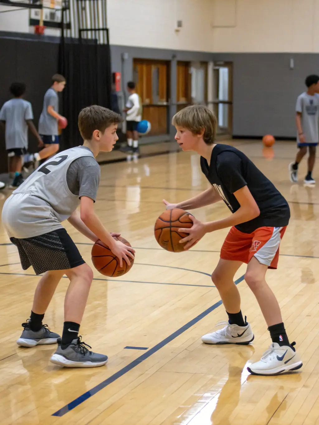 A group of young handball players in Gonfreville practicing a passing drill during a training session, showcasing teamwork and skill development.
